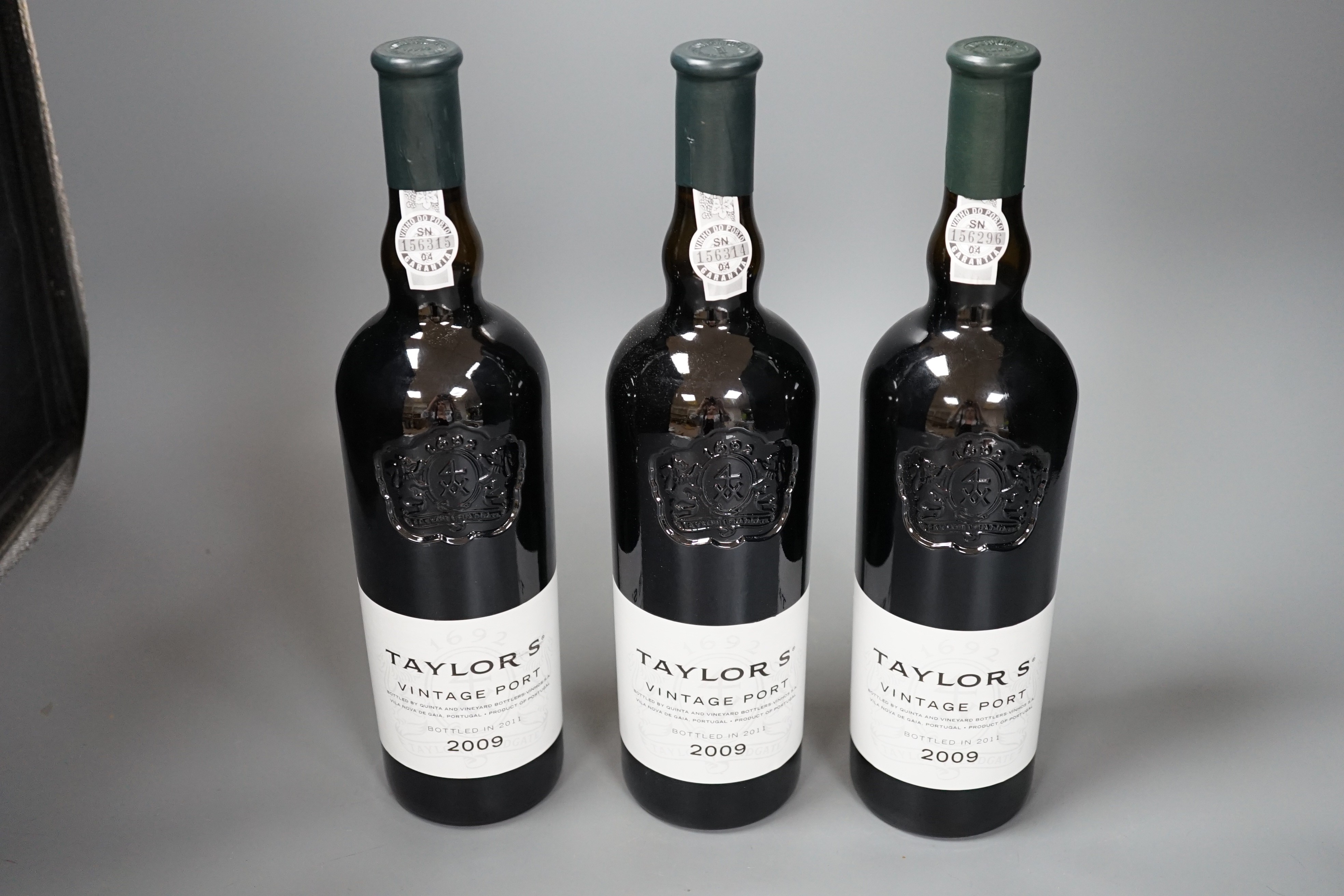 Three bottles of Taylors 2009 vintage port.